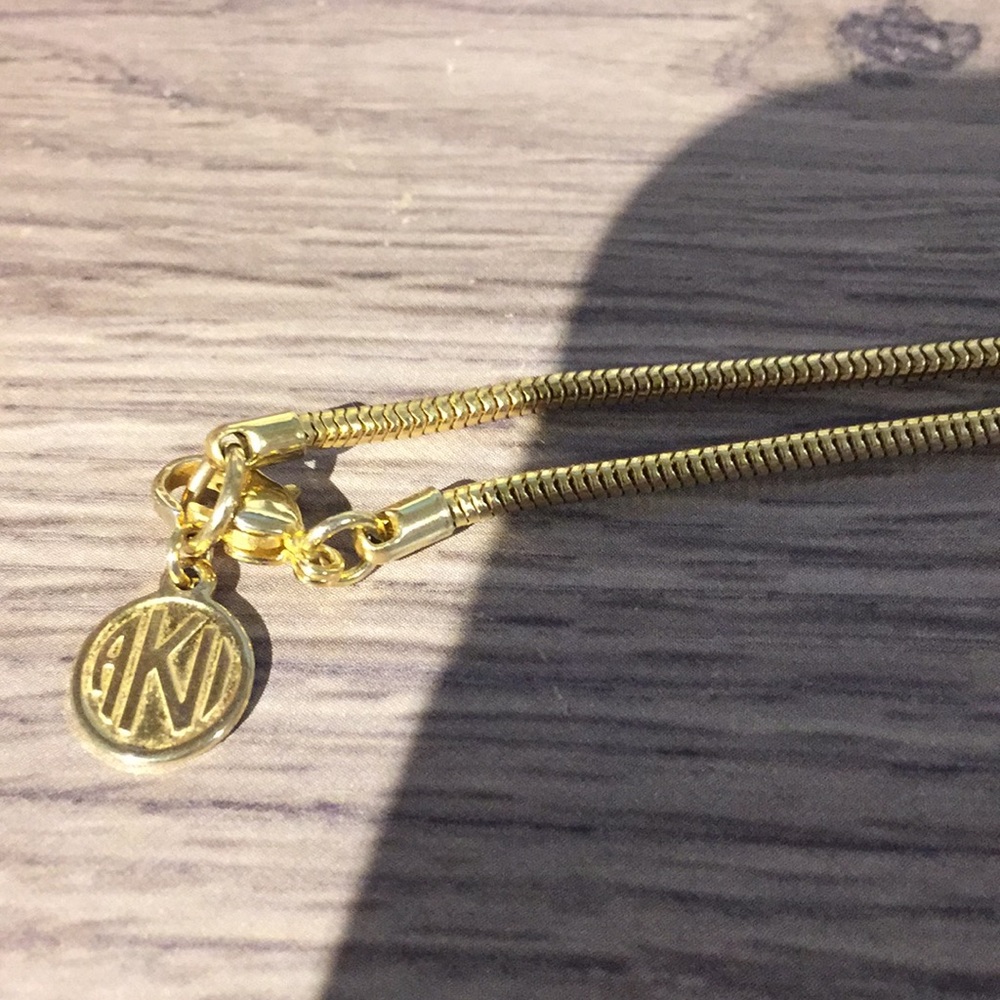 AKI signed necklace jewelry, 31”